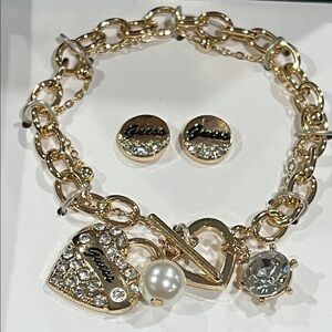 Guess Gold-Tone Charm Bracelet with Crystal Accents